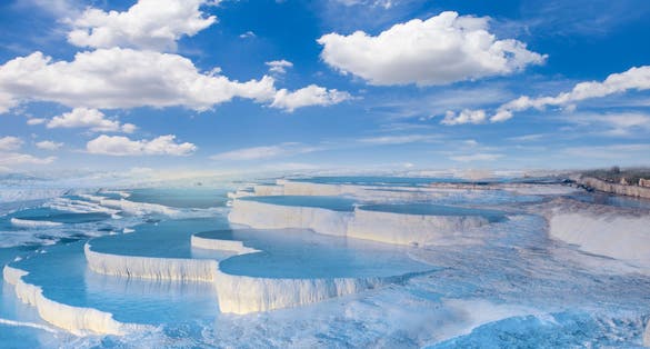 Photo of natural travertine pools and terraces in Pamukkale, Denizli, Cotton castle in southwestern Turkey.