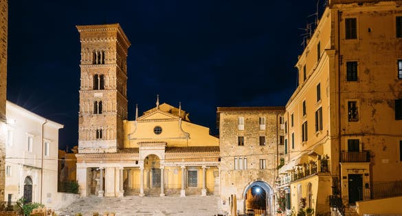 Terracina, Italy. Tower Of Cathedral Of San Cesareo In Night Time. It Built On Podium Of Temple Of Roma And Augustus.
