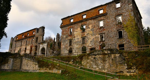 Photo of Ruins of Haasberg castle near Planina in Notranjska, Slovenia on a cloudy day.