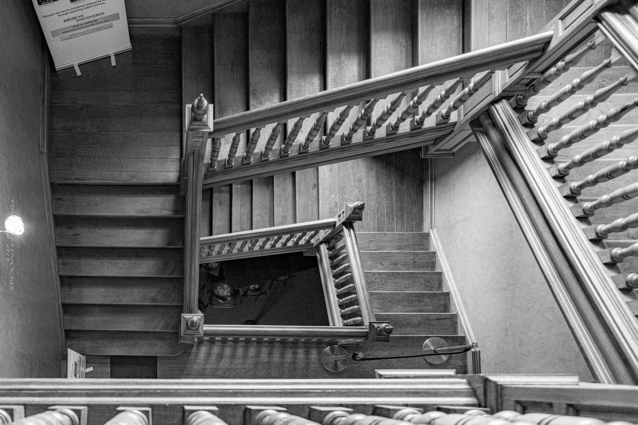 Photo of Callendar House wooden staircase black and white pattern ,Scotland .