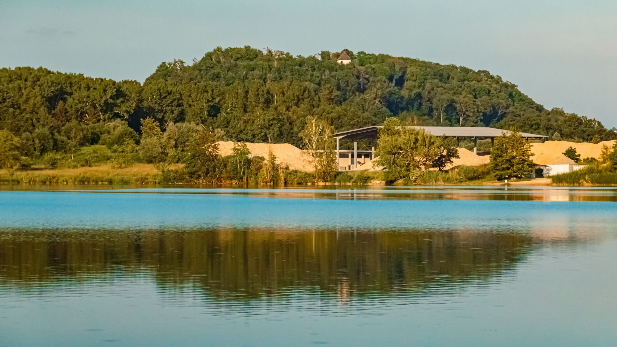 Photo of Summer view with reflections at a pond near Plattling, Isar, Deggendorf, Bavaria, Germany