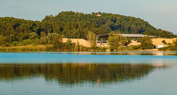 Photo of Summer view with reflections at a pond near Plattling, Isar, Deggendorf, Bavaria, Germany