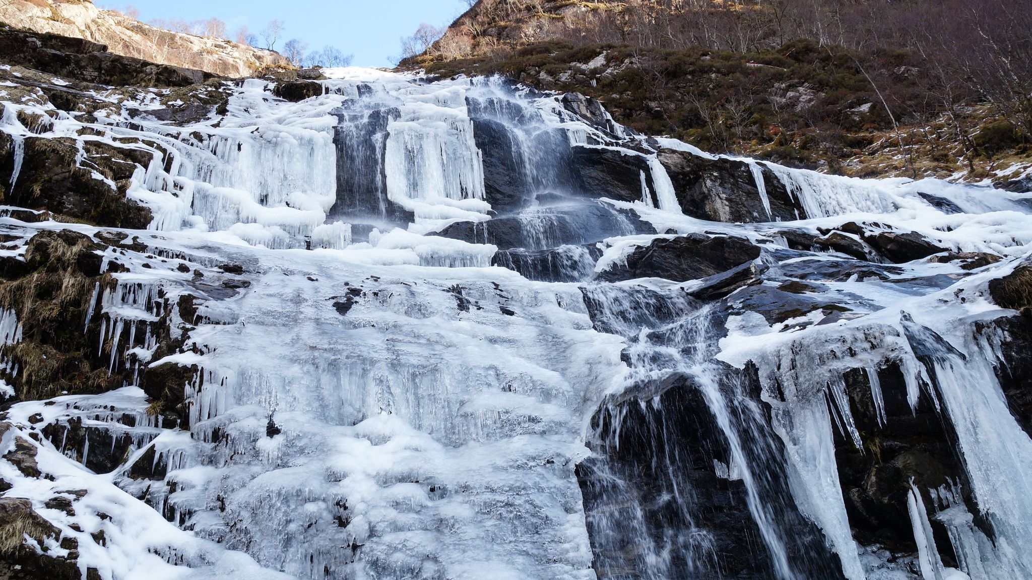 Photo of Creag Meagaidh mountain and Steall Waterfall in the scottish highlands of Scotland.