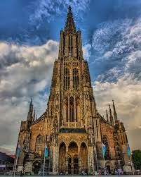 photo of view of Ulm Minster, Cathedral of Ulm city, Germany. Ulmer or Munster on German is famous landmark of Ulm, Germany.