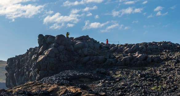 photo of view of Cliffs at the Dyrhólaey Peninsula, Iceland on the tip of Iceland's southern coast, Southern Peninsula, Iceland.