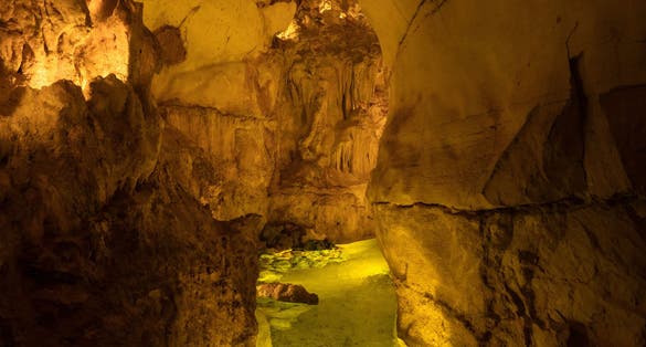 Illuminated lit lights stalagmites stalactites limestone show cave cavern Grutas da Moeda in Batalha Leiria Portugal
