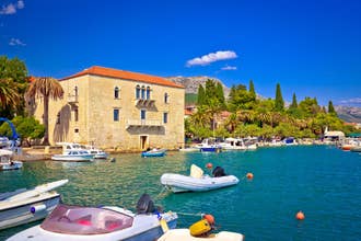 Photo of seafront of Kastel Luksic village summer view, Split region of Dalmatia, Croatia.