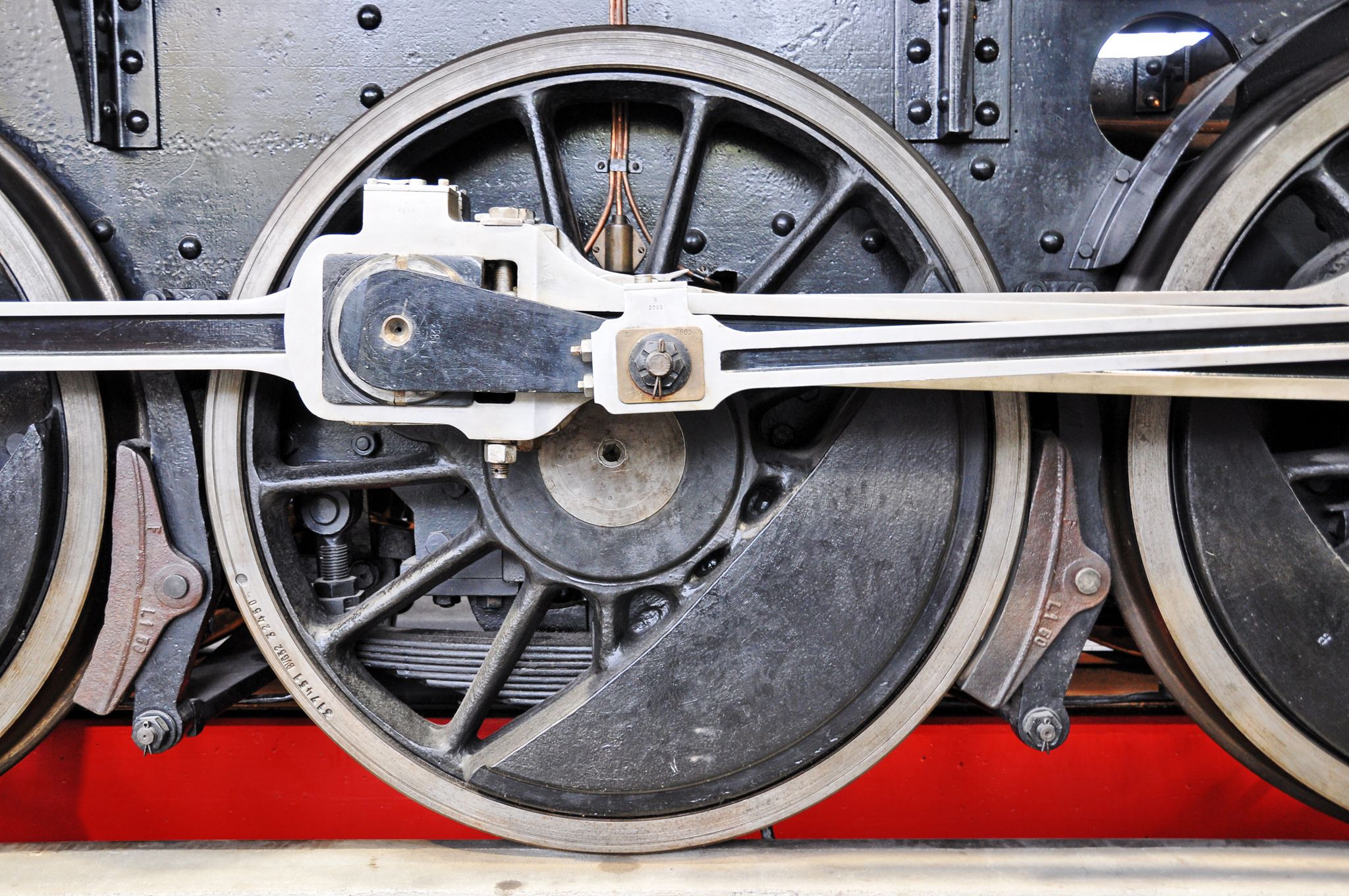 Photo of wheel of an old train in the Museum of Transport in Lucerne, Switzerland.