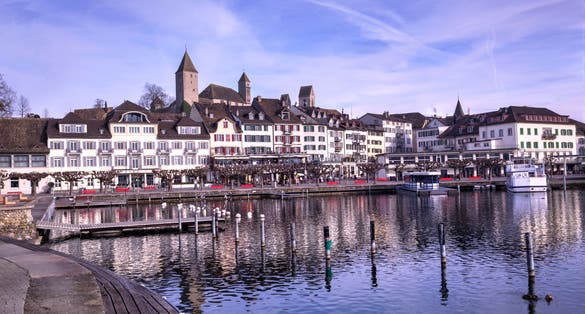 photo of view of Row of houses and building in the Rapperswil-Jona marina and second the most important port of Lake Zurich. Photo taken in 3rd of January 2020 in Rapperswil-Jona, St. Gallen canton, Switzerland.
