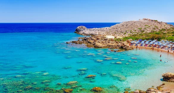 Photo of sea view and beach in Ladiko bay, Rhodes island, Greece, Europe.