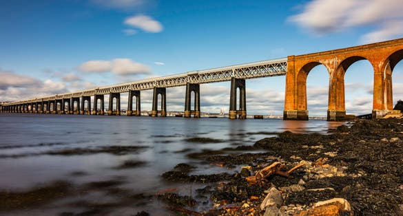 photo of view of tay rail bridge on the firth of tay river, Dundee, Scotland.