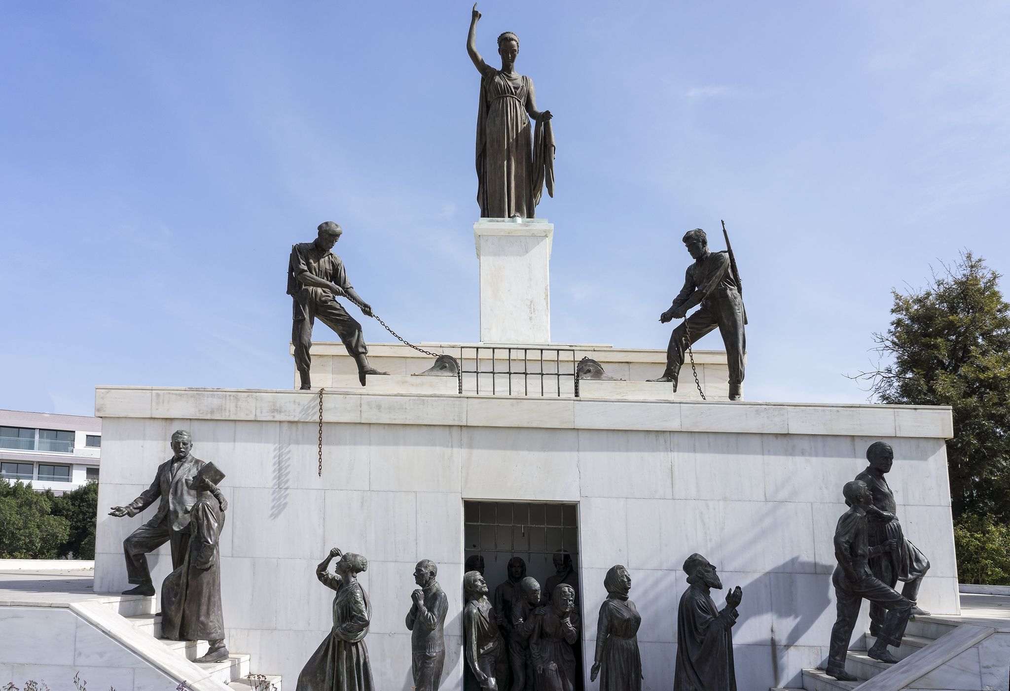 Photo of Bronze Statues on the liberty monument in the city of Nicosia in Cyprus. The monument was erected in 1973 and it symbolizes the Greek Cypriots struggle for independence.