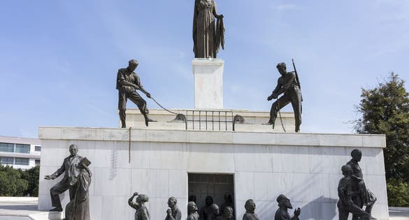 Photo of Bronze Statues on the liberty monument in the city of Nicosia in Cyprus. The monument was erected in 1973 and it symbolizes the Greek Cypriots struggle for independence.