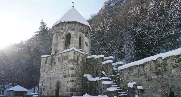 Photo of Mtsvane Monastery in winter ,Georgia. It is medieval complex in a forested valley also known as Green Monastery