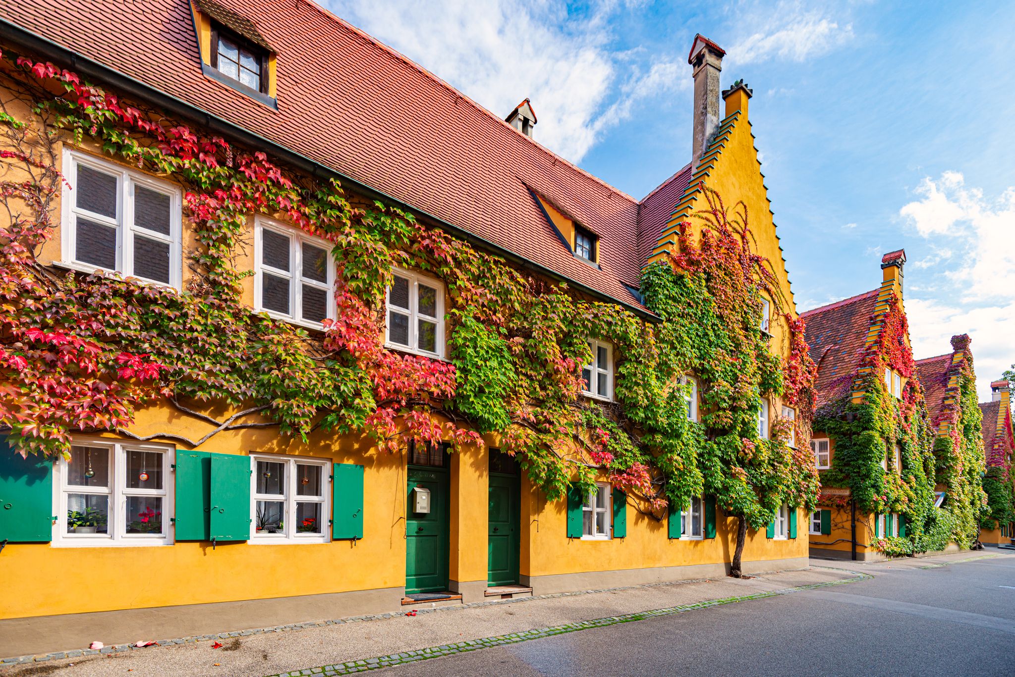photo  of  view of The Fuggerei is the world's oldest social housing complex still in use. It is a walled enclave within the city of Augsburg, Bavaria, Germany.