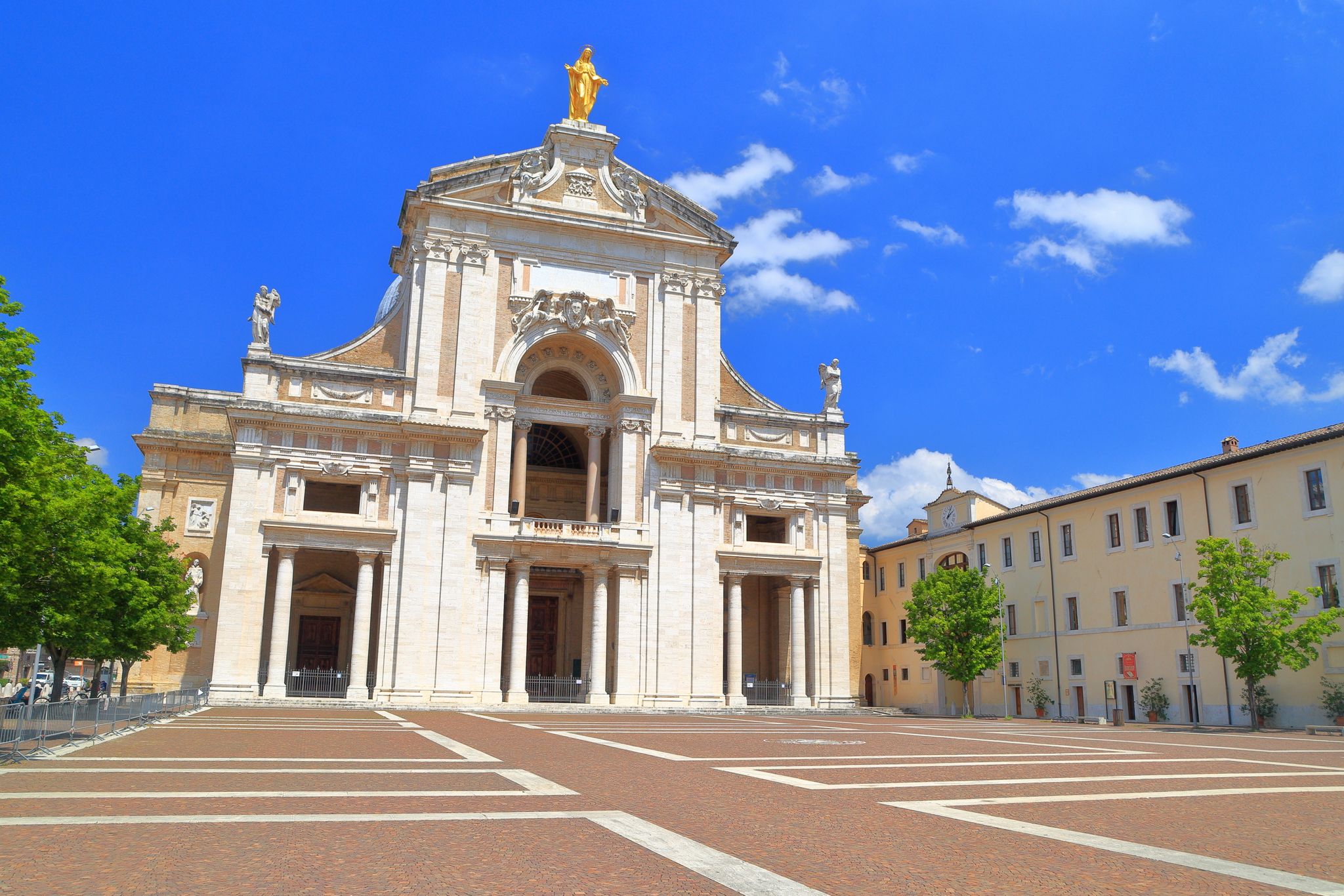 photo of Papal Basilica of Saint Mary of the Angels in Santa Maria degli Angeli, Assisi, region of Umbria, Italy .