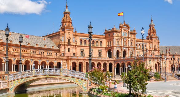 Photo of architecture and canals of Spain square, Seville, Spain.