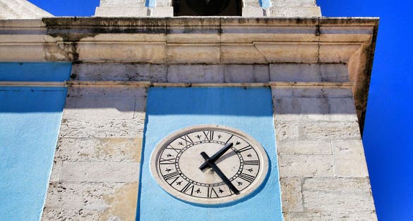 Beautiful facade of Nossa Senhora do Bom Sucesso church in Cacilhas, Lisbon, in a sunny day of Spring.