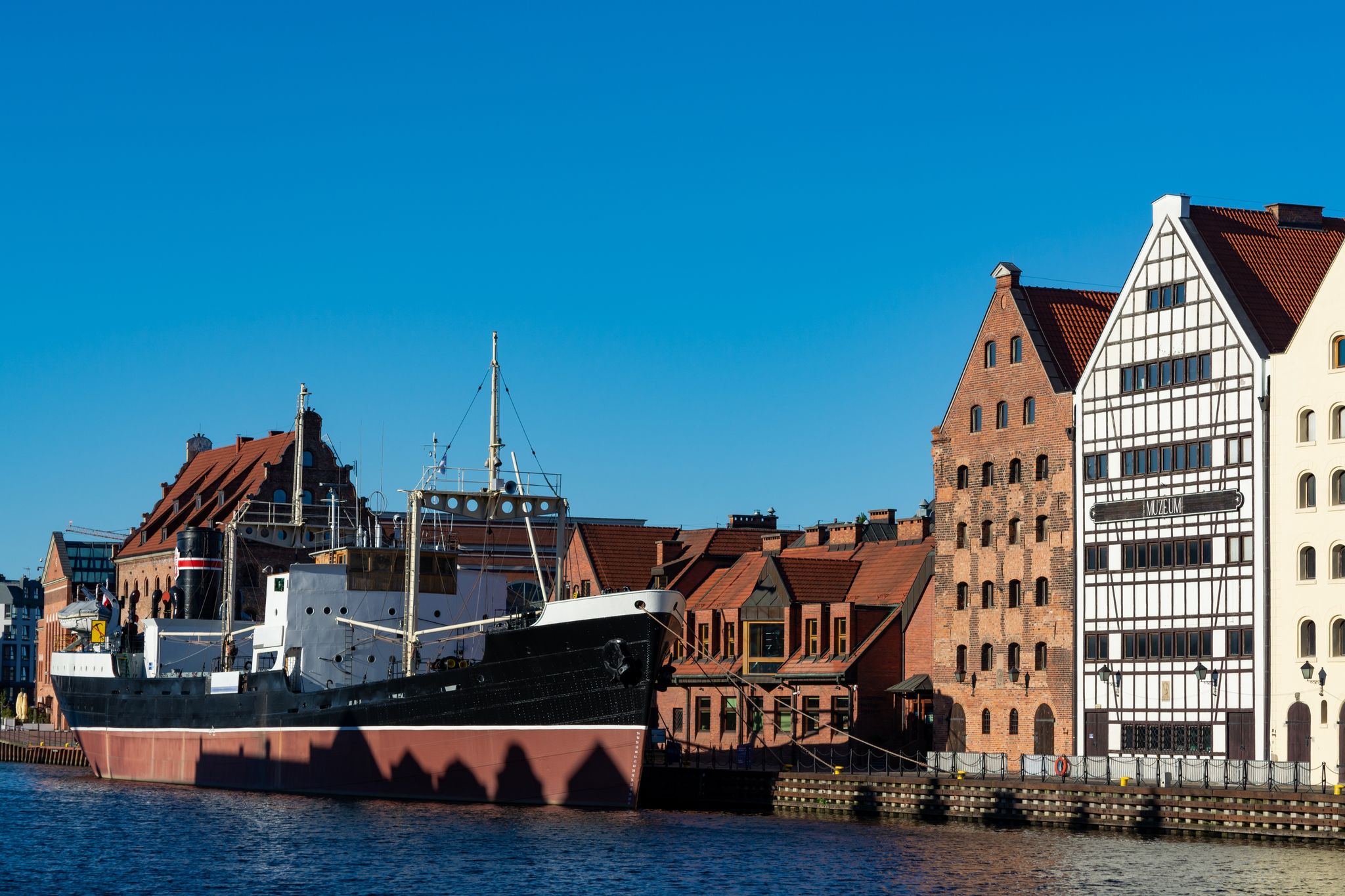 Colorful facades and buildings in old central part of Gdansk city, Poland in sunny day
