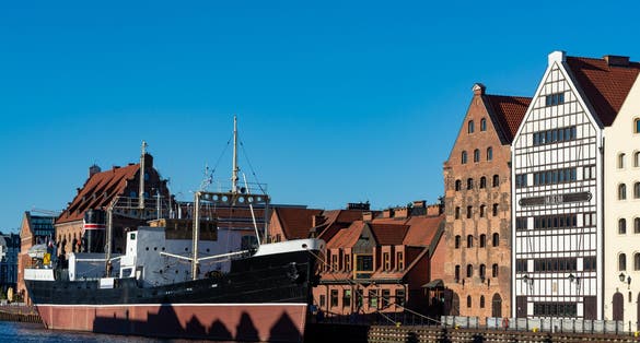 Colorful facades and buildings in old central part of Gdansk city, Poland in sunny day