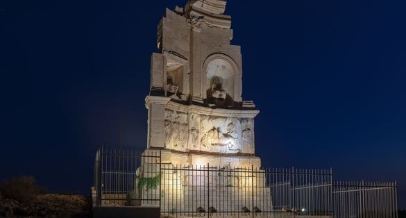 photo of viewof Philopappos Monument at Filopappou hill at night, Athens, Greece.