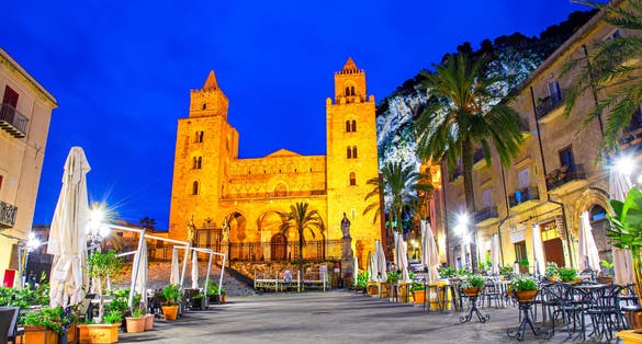 photo ofCefalu, Sicily, Italy: Night view of the town square with The Cathedral or Basilica of Cefalu, Duomo di Cefalu, a Roman Catholic church built in the Norman style