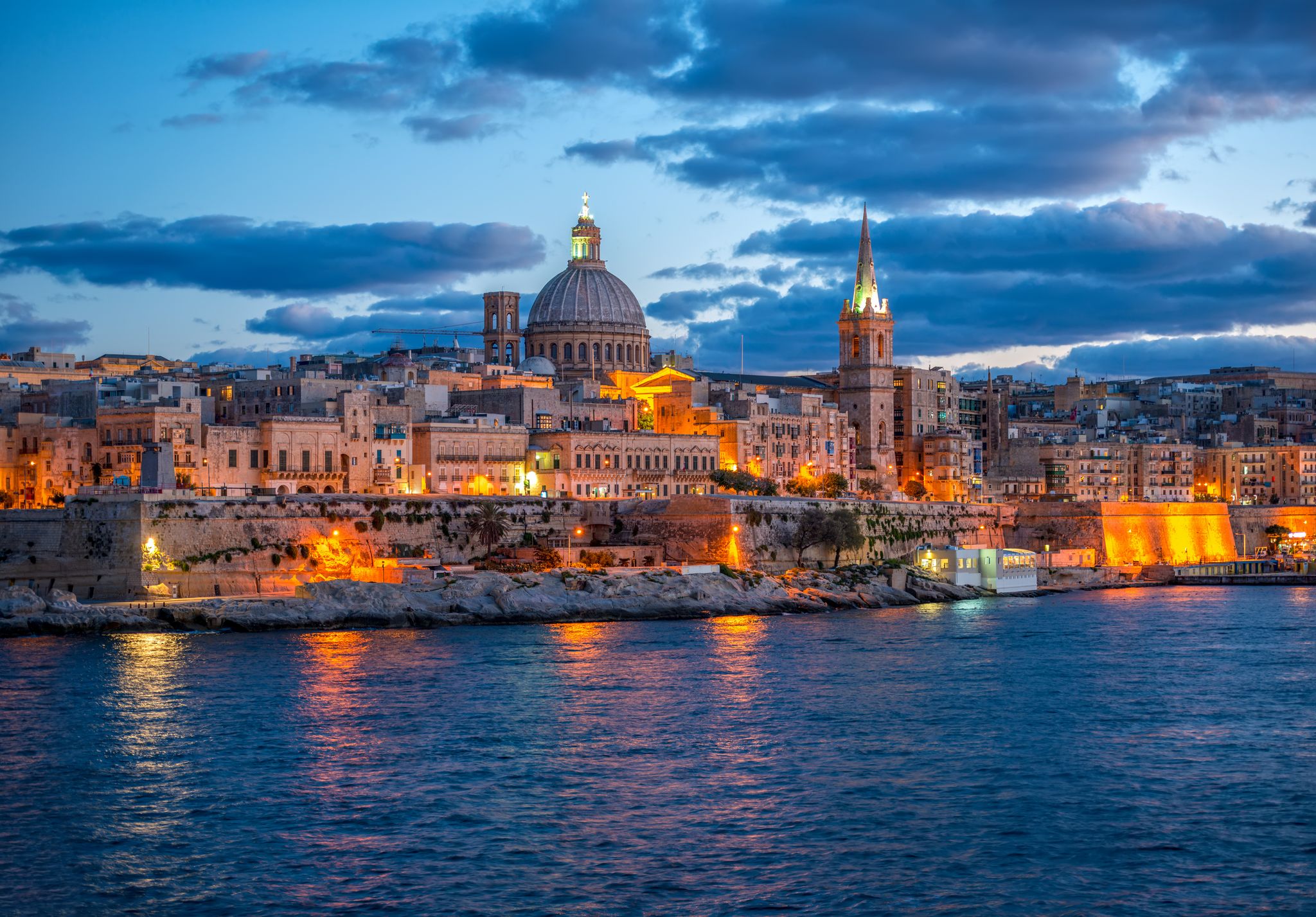 beautiful european landscape with Basilica Our Lady Mount Carmel to Valletta from Sliema, Malta