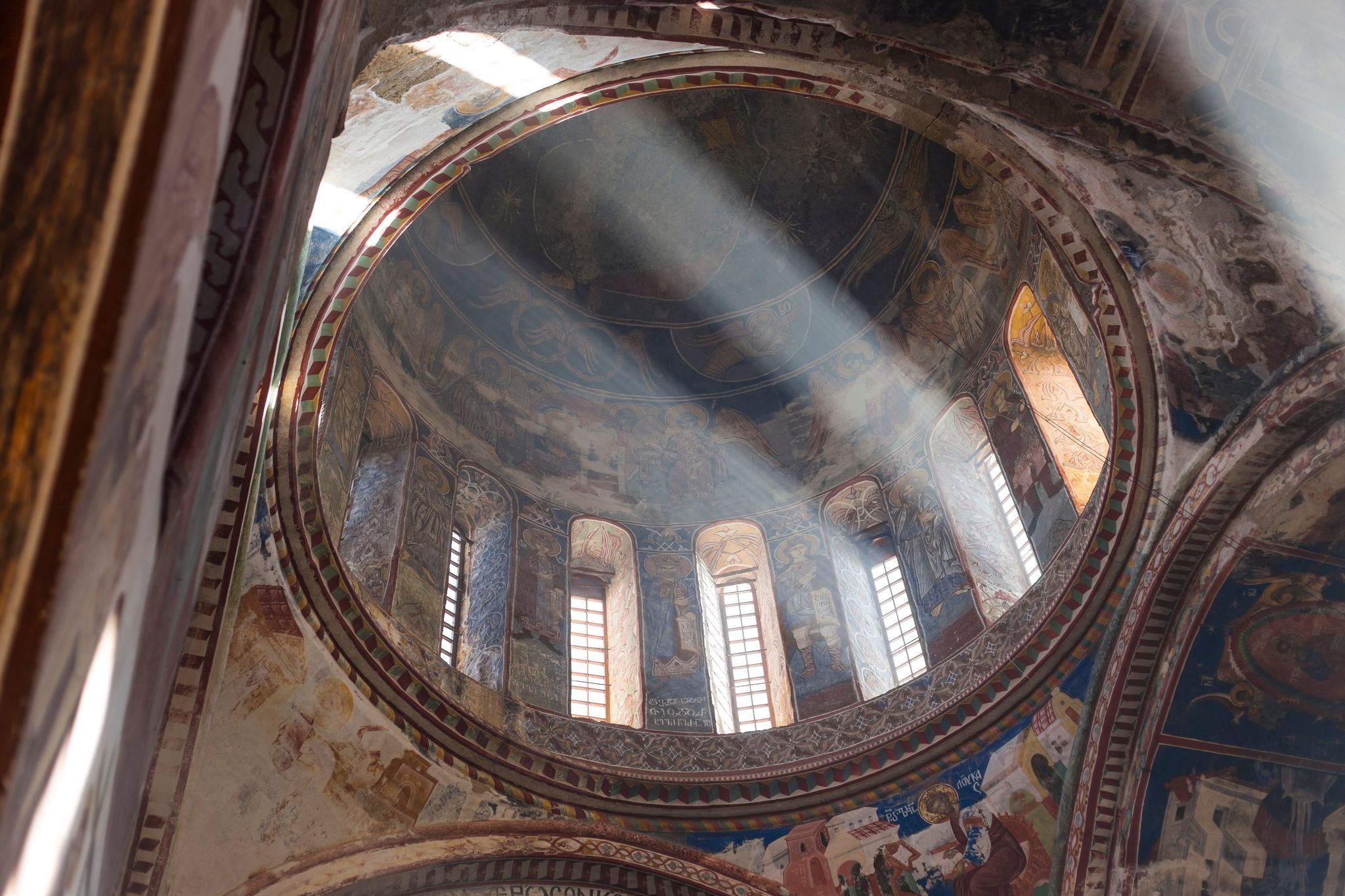 Photo of Mesmerizing rays of light coming into the main church of Kutaisi Bagrati Cathedral, Georgia.