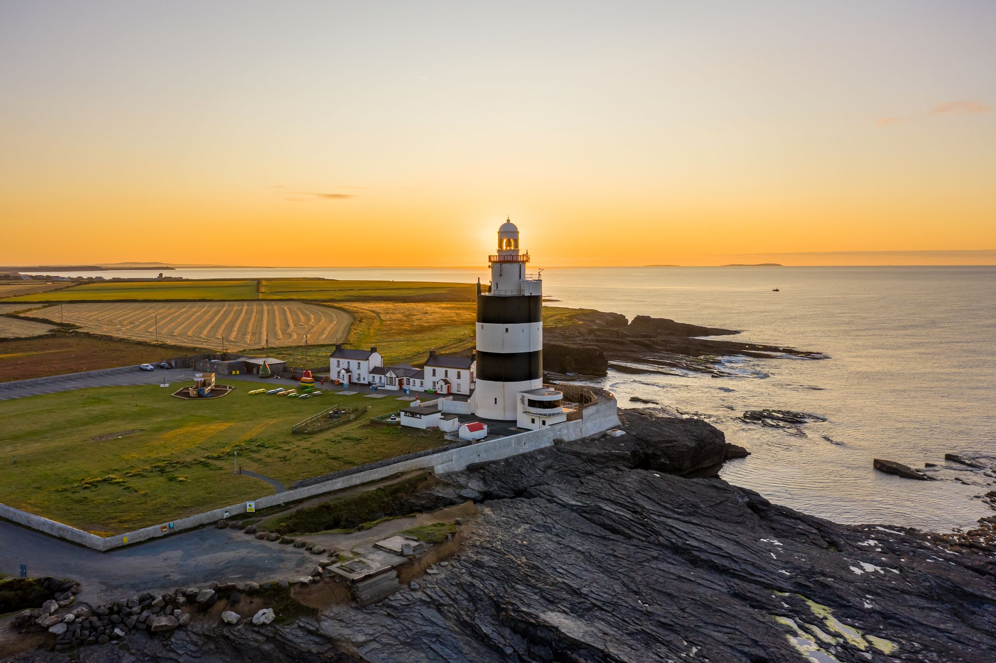 Photo of aerial view, Hook Lighthouse is a building situated on Hook Head at the tip of the Hook Peninsula in County Wexford, in Ireland.