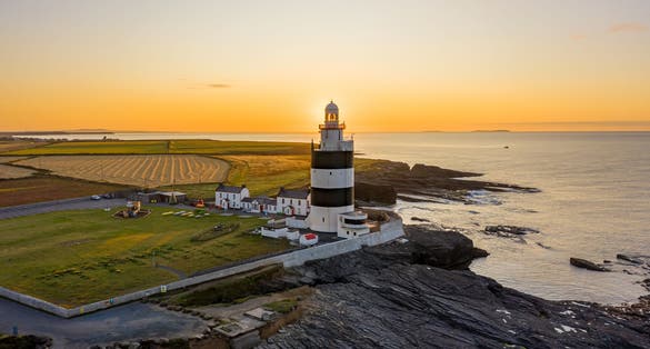 Photo of aerial view, Hook Lighthouse is a building situated on Hook Head at the tip of the Hook Peninsula in County Wexford, in Ireland.