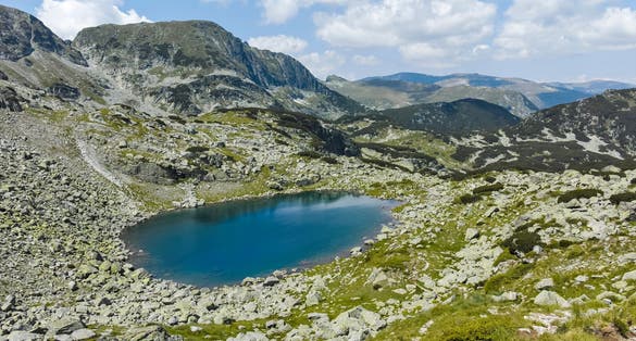 photo of view of Lake at the trail from Malyovitsa hut to Scary (strashnoto) Lake, Rila Mountain, Bulgaria,Kyustendil bulgaria.