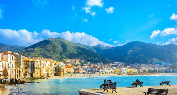 view of beach town of Cefalu in Sicily, Italy.