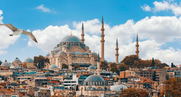 Beautiful view of gorgeous historical Suleymaniye Mosque, Rustem Pasa Mosque and buildings in a cloudy day. Istanbul most popular tourism destination of Turkey. 