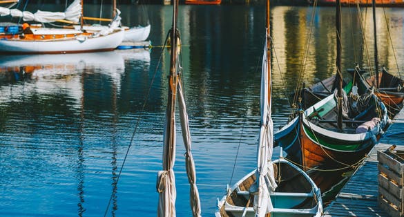 photo of view of Closeup view of boat in the Kristiansund port, on the fjord coast, located in the Norwegian archipelago
