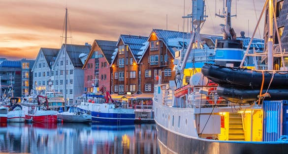Tromso harbour at sunset, Norway.