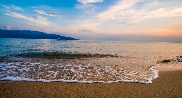 Photo of beautiful sunset on the beaches of Keramoti, Kavala, Greece