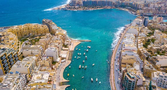 Photo of beautiful aerial view of the Spinola Bay, St. Julians and Sliema town on Malta.