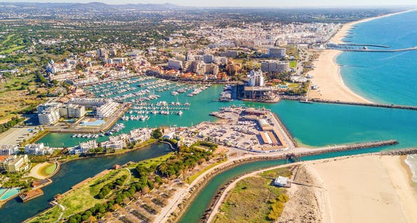 Photo of aerial view of luxurious and touristic Vilamoura, Algarve, Portugal.