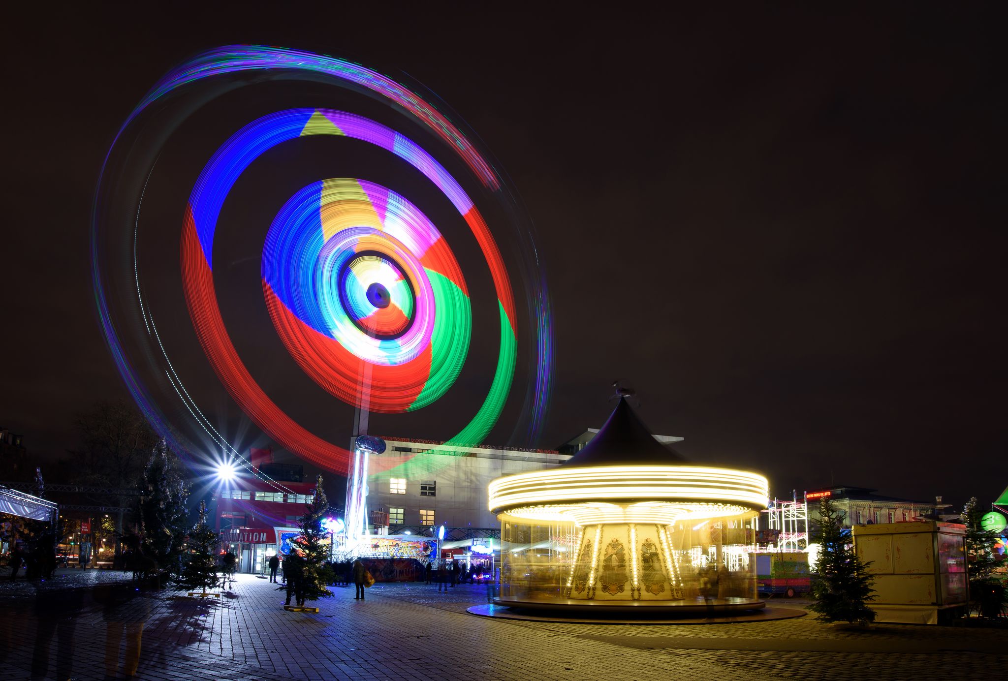 photo of Ferris wheel in La Villette Park at night in Paris, France.