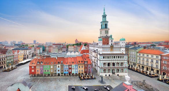 Photo of aerial view of Rynek (Market) square with small colorful houses and old town hall, Poznan, Poland.