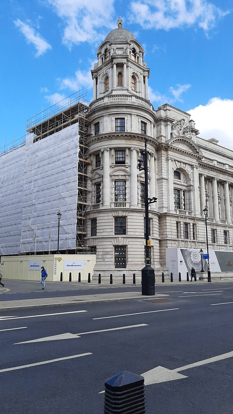 London, England - Panoramic skyline view of Bank and Canary Wharf, central London's leading financial districts with famous skyscrapers at golden hour sunset with blue sky and clouds.