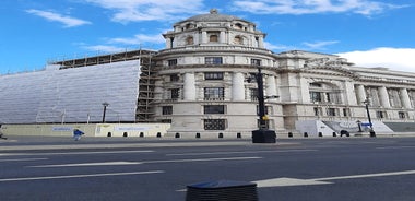London, England - Panoramic skyline view of Bank and Canary Wharf, central London's leading financial districts with famous skyscrapers at golden hour sunset with blue sky and clouds.