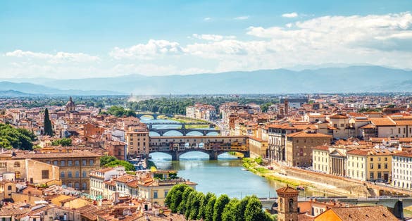 Photo of Florence Aerial View of Ponte Vecchio Bridge during Beautiful Sunny Day, Italy.