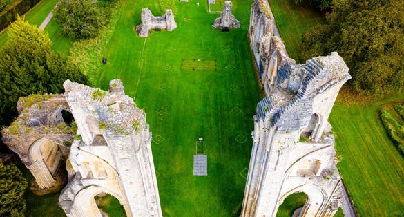 Photo of aerial view of ruins of Glastonbury Abbey, was a monastery in Glastonbury, Somerset, England.