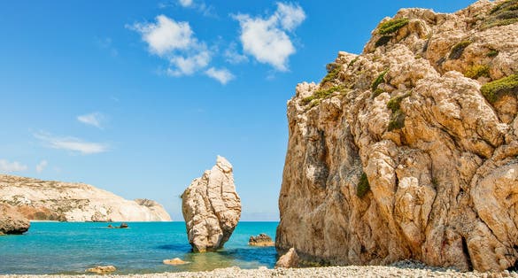 Photo of the famous beautiful beach of Aphrodite's rock or Venus rock, Petra tou Romiou, Cyprus.