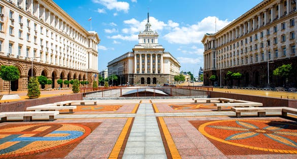 Photo of an architectural ensemble of three Socialist Classicism edifices in central Sofia, Bulgaria.