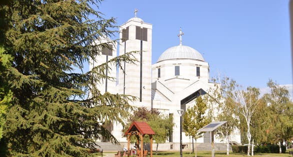 The green park in Niš with old orthodox Church. The centar of Medijana municipality.