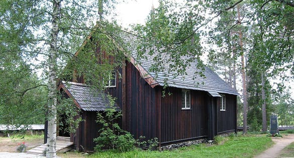 Photo of old wooden church of Sodankylä village, Finland.