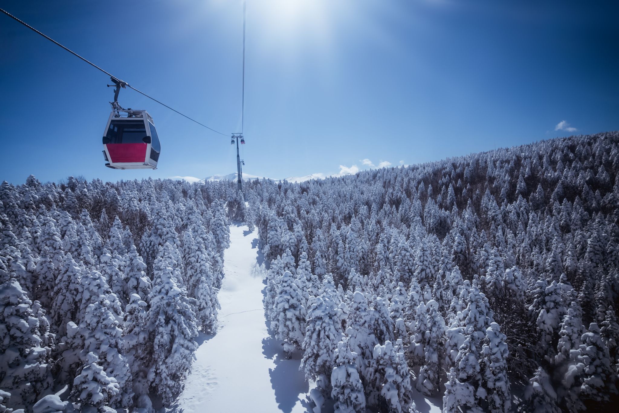 photo of cable car way to snowy uludag mountains in bursa turkey with beautiful view from the top.