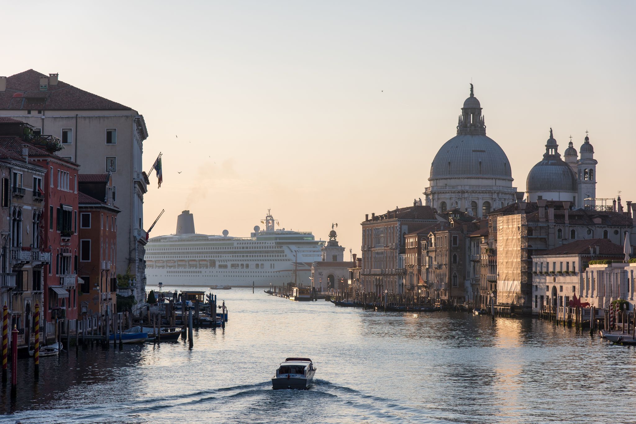 photo of A wide angle shot of the Gallerie dell'Accademia Museum next to the water in Venice, Italy.